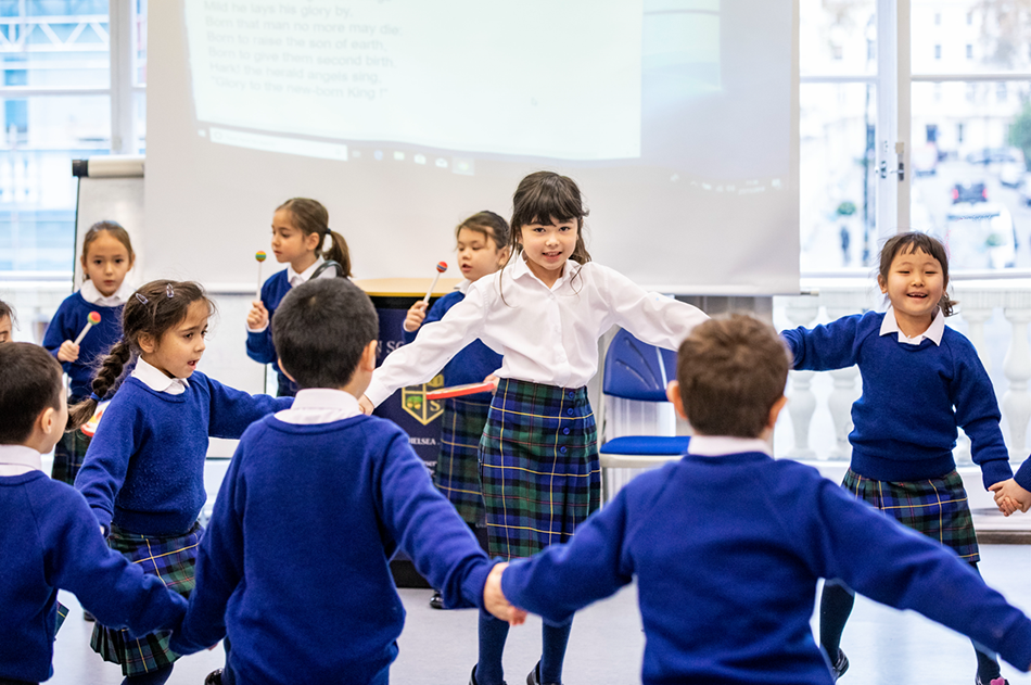 children holding hands in a circle