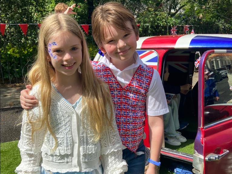 students together wearing British-themed clothing