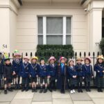 group of children from a prep school pimlico standing inter