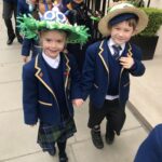 children taking their easter bonnets outside