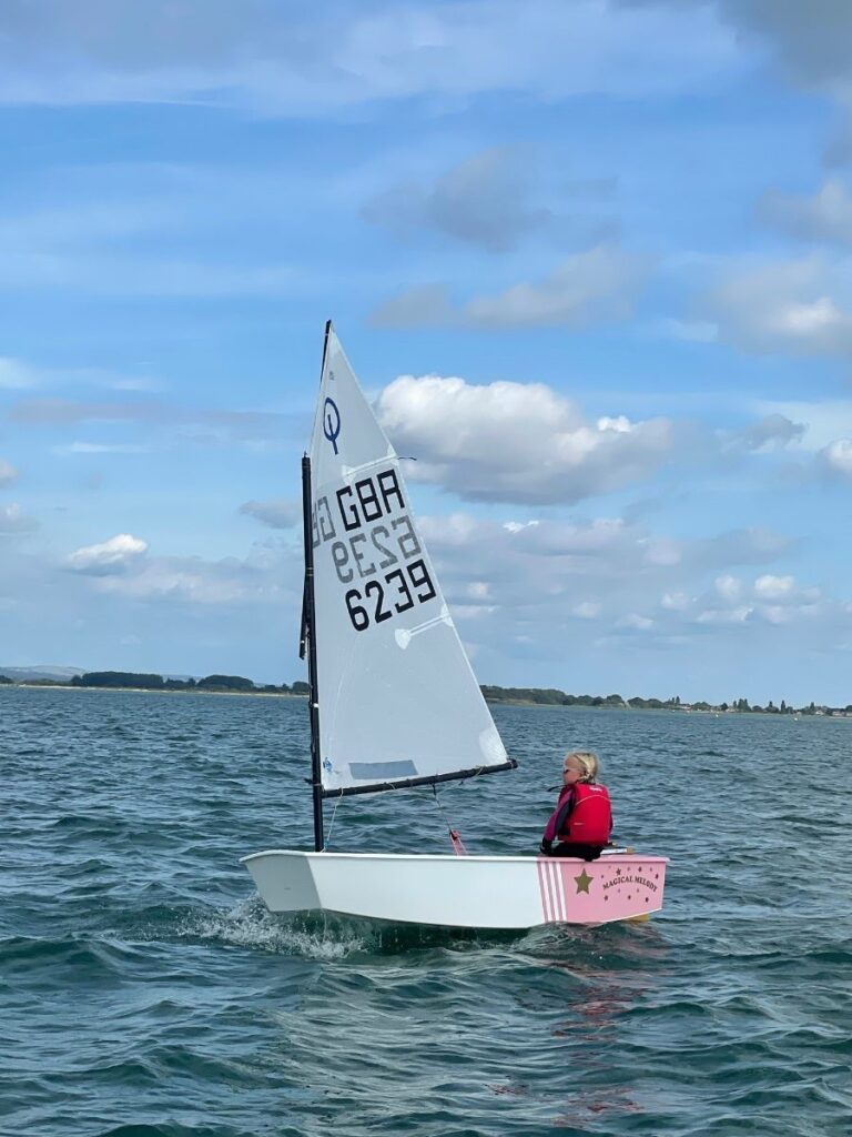 a child on a sail boat